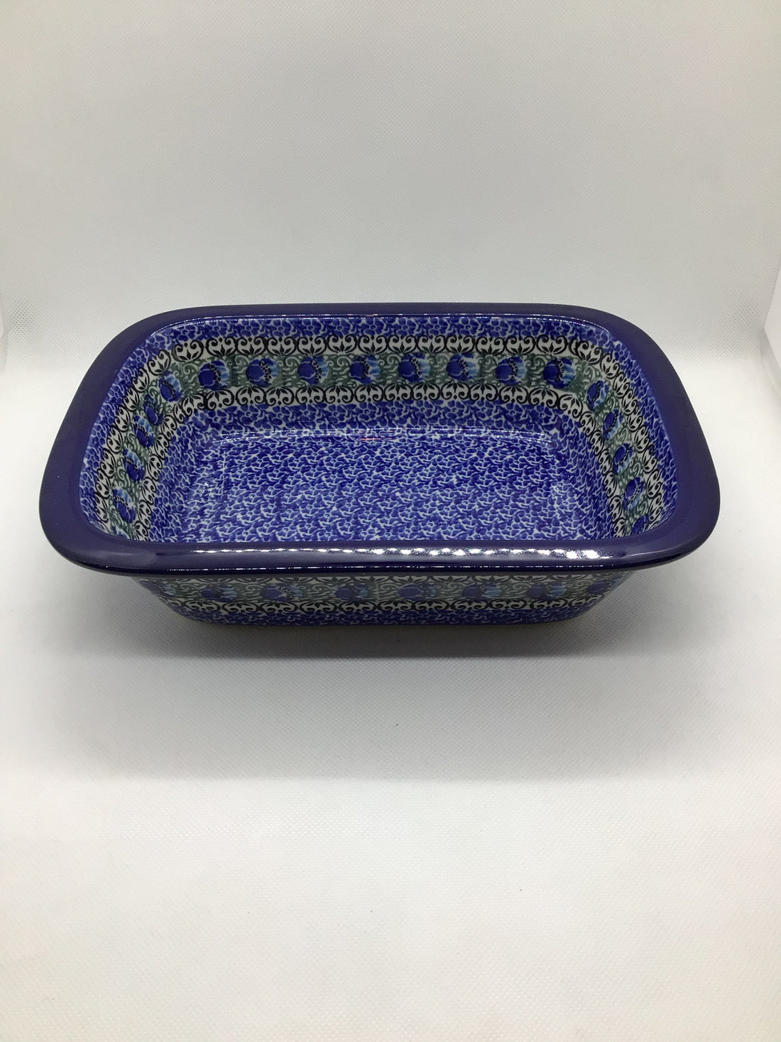 Peacock Feather Grip Edge Baker 10x7